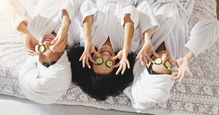 Spa, cucumber and smile with friends in hotel for beauty treatment, bonding and hospitality